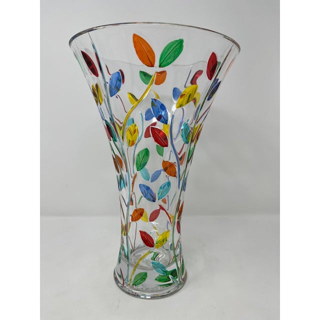 This lovely vase features incredible colors and it would be a wonderful addition to any room. Handcrafted in Italy of fine...