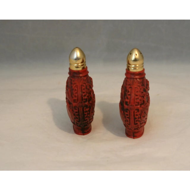 Vintage Asian Snuff Bottles Plastic Salt and Pepper Shakers These vintage salt and pepper shakers were made in Hong Kong...
