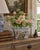 A distinctive mid-century Italian tulipiere or flower-frog vase, hand painted with an exuberant Chinoiserie garden scene....