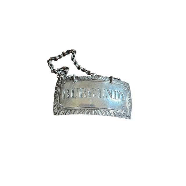 A very rare George lll bottle ticket by Hester Bateman . Rare title.