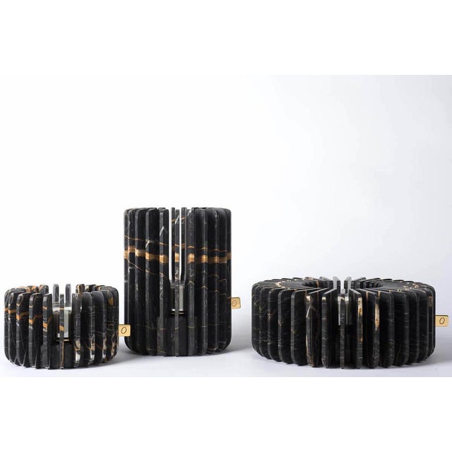 St laurent orion candleholder set by dan yeffet dimensions: ø 18.7 x h 12 cm ø 19.7 x h 25 cm ø 32 x h 12 cm materials:...