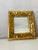 19 th c Heavily ornate handcarved wood gold leaf frame mirror.