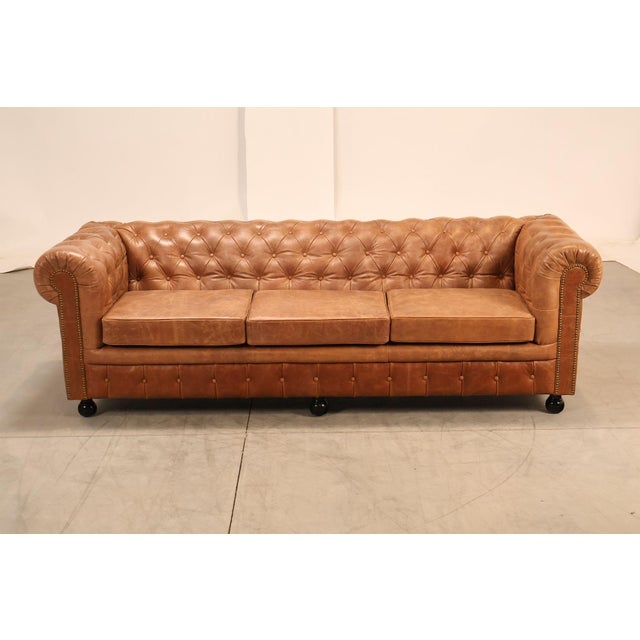 High Quality Chesterfield Style Sofa Featuring A Traditional Chesterfield Silhouette With Deep Button Tufted Back And...
