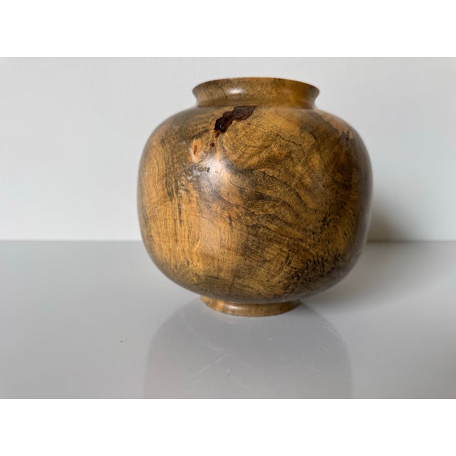 This stunning vintage hand-turned wood vase by Jim Vander showcases the beauty of natural Buckeye Burl wood. The organic...