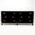 Chic mid century ebonized chest crafted in a modern campaign form with six drawers, brass hardware and straight legs with...