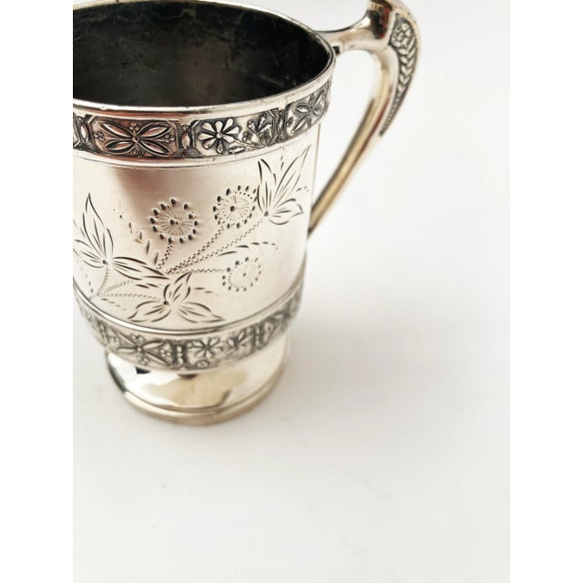 This late 19th century quadruple silver-plate cup, from Pelton Brothers & Company, St. Louis, is a reminder of an era of...