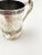 This late 19th century quadruple silver-plate cup, from Pelton Brothers & Company, St. Louis, is a reminder of an era of...
