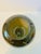 Add a touch of retro sophistication to your home decor with this gorgeous, vintage hand-blown glass globe vase. This...