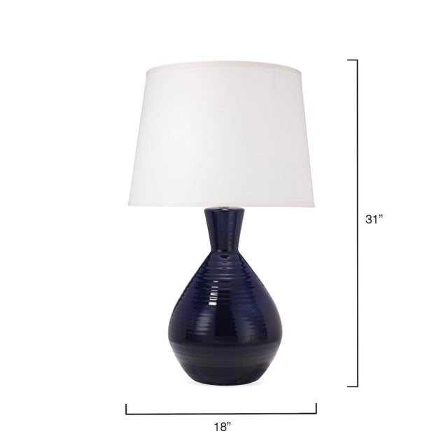 The Ash lamp is the perfect pop of navy, paired with a casual shape and just enough texture to keep it interesting....
