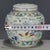A charming Chinese porcelain covered jar decorated in the classic Doucai style, featuring underglaze blue outlines filled...