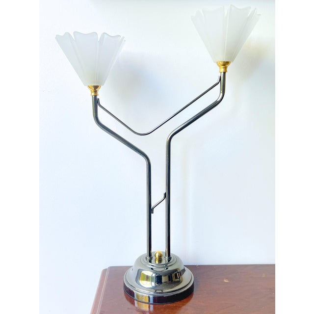 Chic table lamp in a beautiful classic design from renowned belgian lighting manufacturer massive. this luxurious lamp has...