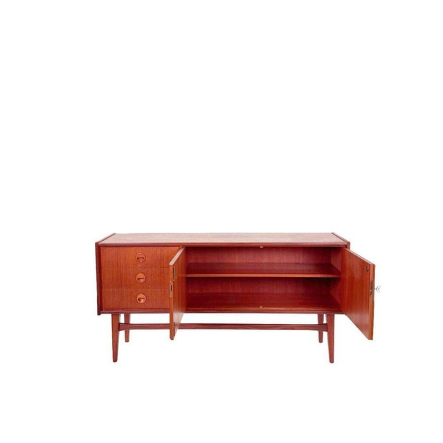 This teak sideboard from Bartels Werke exudes the quiet confidence of German mid-century design. Designed and manufactured...