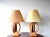 A pair of mid-century modern sculptural table lamps in oak wood and brass, c. 1950s. Original pleated shades, one a little...