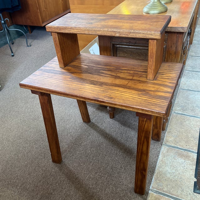 Two tiered cowboy ranch rustic style table. Minor wear from use gives it character commensurate with its age. Please see...