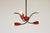 Beautiful modernist lamp, made in Italy in the 1950s. Brass and red lacquered sheet metal. Very good original condition....