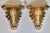 A stunning pair of large gold gilded resin acanthus leaf wall shelves. This is a bright and lovely sculptural pair. The...
