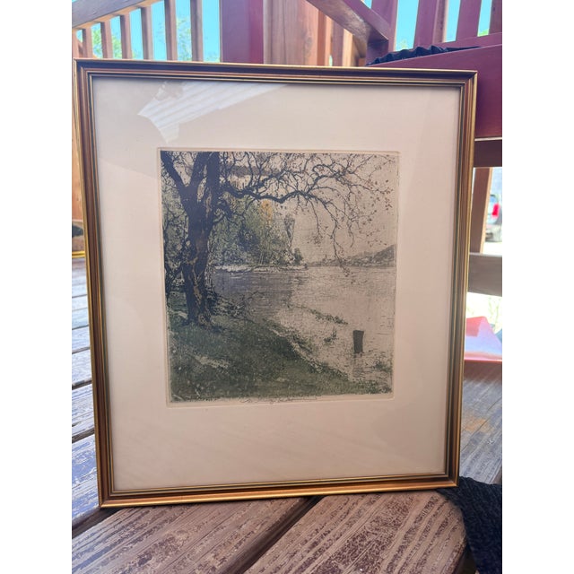 An original hand-colored etching by renowned Austrian printmaker Luigi Kasimir (1881–1962) depicting Persenbeug on the...
