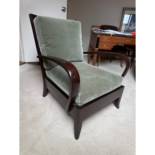 Dakota Jackson Ceylon lounge chair with matching ottoman. Solid cherry, kiln-dried hardwood frame. Doweled and corner-...