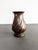 Striking hand-hammered copper floor vase with an elegant twisted design, made in Italy and stamped Made in Italy. Likely...
