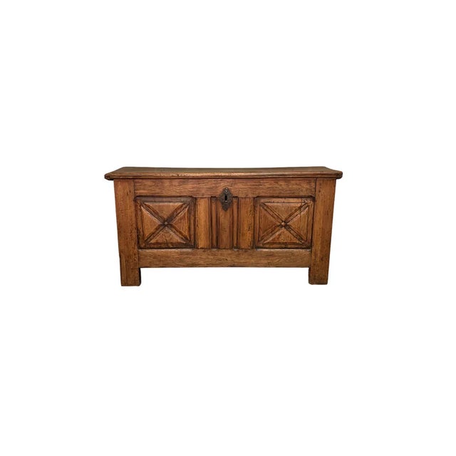 Magnificent 18th-century antique chest, crafted from solid walnut. The front is embellished with elegant panels carved...