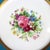 A set of twelve French Limoges porcelain luncheon plates by G. Ahrenfeldt, dating to approximately 1900. Each plate...