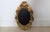 Metal Early 20th Century French Gilt Bronze Rococo Oval Wall Mirror For Sale - Image 7 of 7