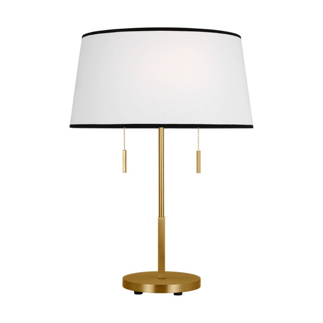 Simply elegant, the Ellison lamp series by kate spade new york is crafted of brass with a slender, streamlined body in a...