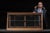 Antique display or show case with glass shelving. This piece features a single glass shelf inside, with the option to...