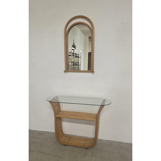 Bamboo console table with mirror. elegant curved bamboo console table with glass top and matching mirror. ideal for the...