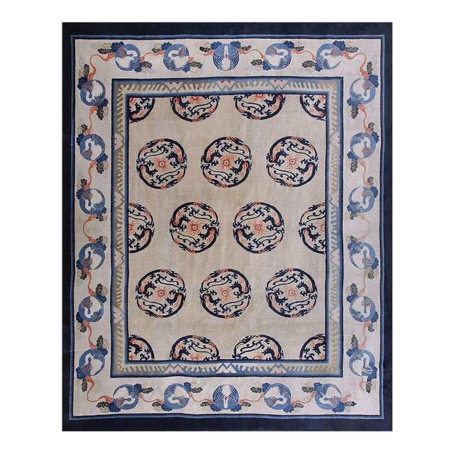 1920s Ivory and Blue Dragon Roundels Antique Chinese Baotou Room Size Rug For Sale
