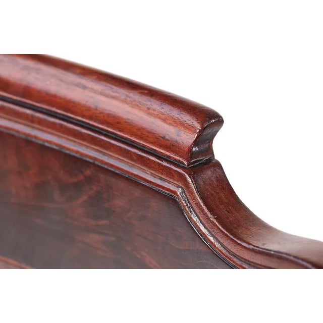 Quality set of four Regency antique mahogany dining chairs having a beautiful shaped flame mahogany top rail with a reeded...