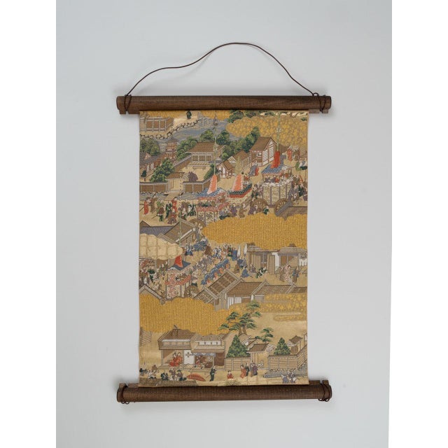 The whole of Edo, woven into a single Fukuro-obi. The most complex textile in the collection. The Kin'un Emaki is a wall...