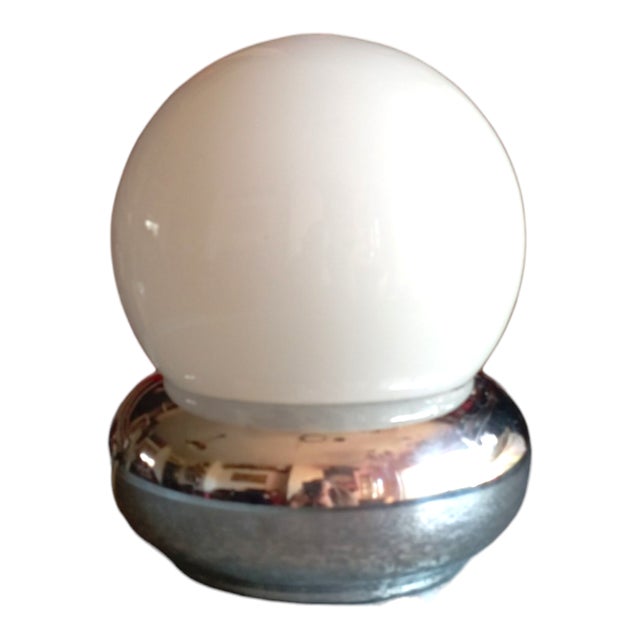 This vintage space age table lamp, with its unmistakable futuristic design, is an iconic piece from the 1960s and 1970s....