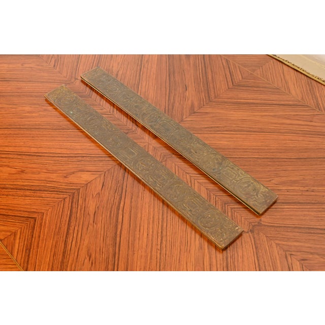 A gorgeous pair of Art Deco or Arts & Crafts period bronze blotter ends featuring symbols of the Zodiac By Tiffany Studios...