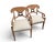 This pair of Biedermeier-style armchairs blend the architectural aesthetic of Neoclassicism with the decorative...