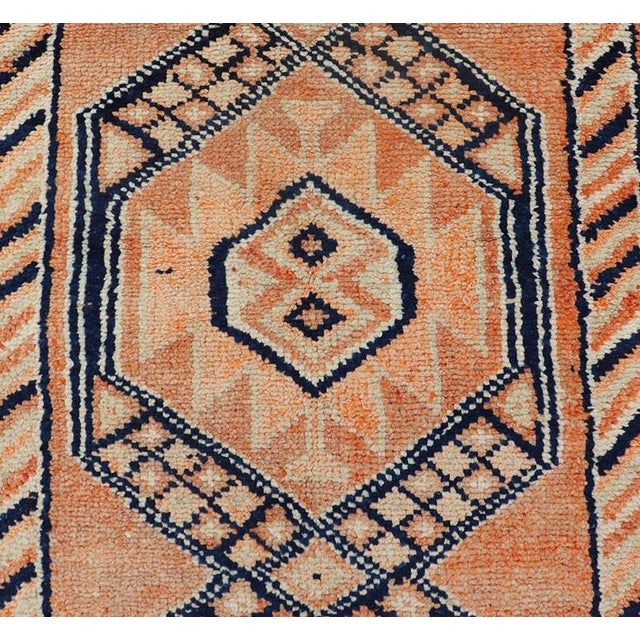 Tribal Medallion Design Vintage Turkish Runner in Orange and Navy Blue For Sale - Image 9 of 12