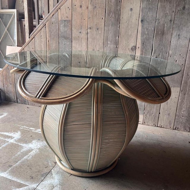 Green stained pencil reed rattan flower head pedestal glass top dining table attributed to Italian designer Gabriella...