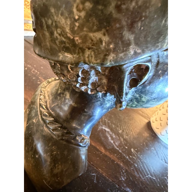 Zimbabwe soapstone sculpture of woman. Large and heavy, most likely carved from soapstone or serpentine Known as a...