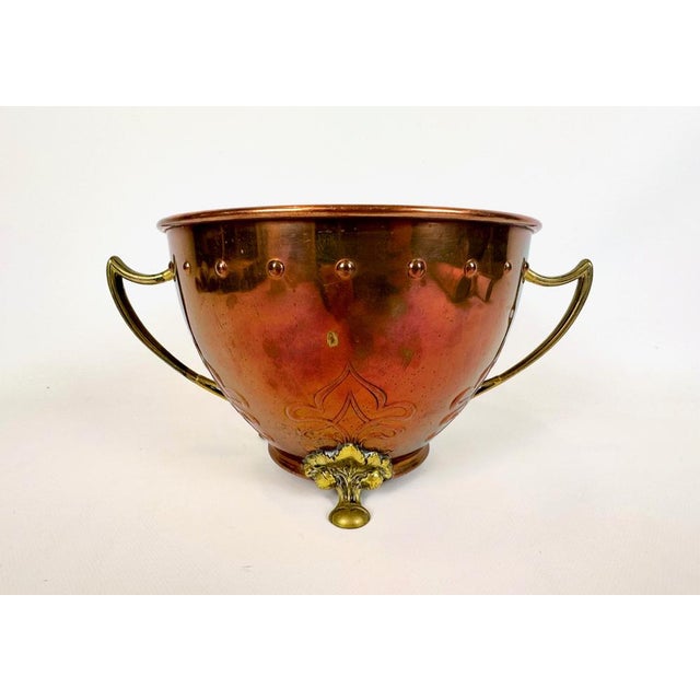 The makers mark on the bottom of the vessel was used at the WMF factory until 1914. This piece has an attribution mark, I...