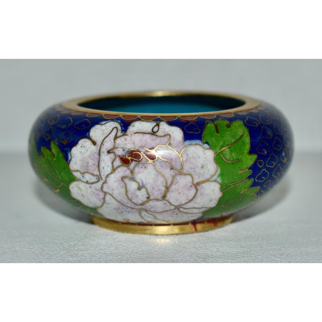 Vintage (1980's) Mini Cloisonné Bowl is Chinese. Multi- Colored with Floral Details. The Measurements: 3"Dia. x 1.5"H....