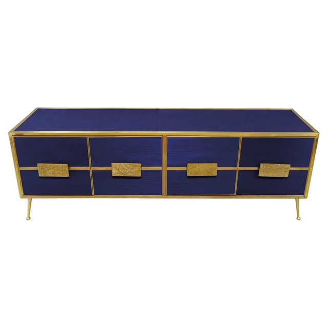 This exquisite Italian sideboard in birch wood and blue glass is a masterpiece of mid-century modern design. Handcrafted...