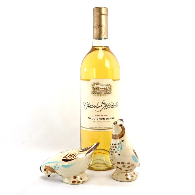 A fun ceramic salt and pepper shaker set of a pair of quail. The molded quail are hand painted in a modernist style with...