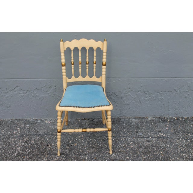 1940's carved wood, patinated occasional chair. Powder blue fabric in good condition. Upholstery tacks in place. 19"seat...