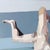 Untitled II by Ale Casanova | Oil on canvas depicting a figure in a contorted pose on a couch. For Sale - Image 4 of 5
