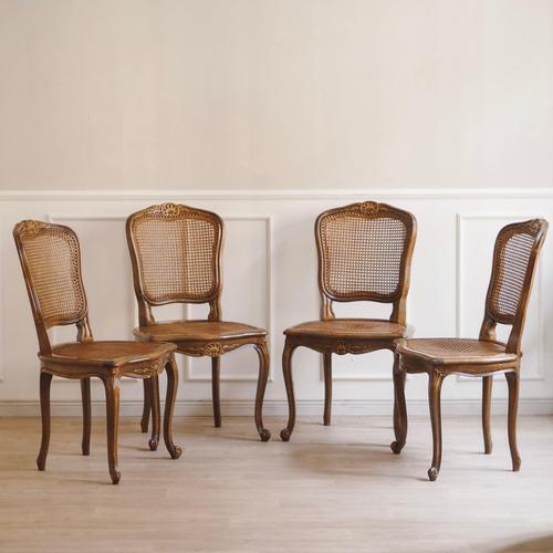 This exquisite set of four french louis xv-style chairs combines quality craftsmanship with classic charm. The curved legs...