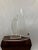 Sleek Lucite sculpture of a sailboat, signed and numbered 362/500 by Eugene Brignola. The sails move and the hull is...