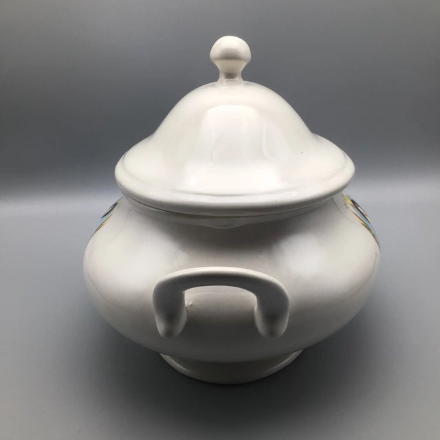 Here is a 100th anniversary Nabisco white ceramic soup tureen with the lid.