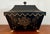 Decorative black tole footed box with scalloped edge and rim handles. Lovely chinoiserie decoration by Sarreid.