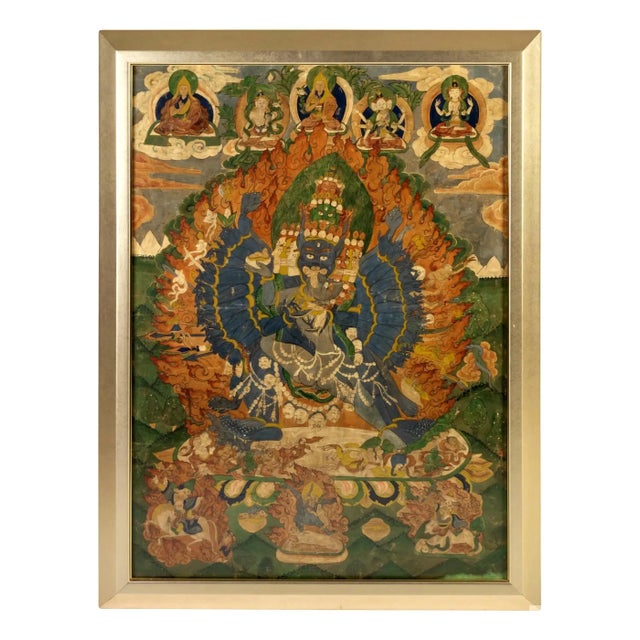 An antique Tibetan Thangka with polychrome pigments on cloth, circa mid to late 19th century. It depicts Yamantaka, also...