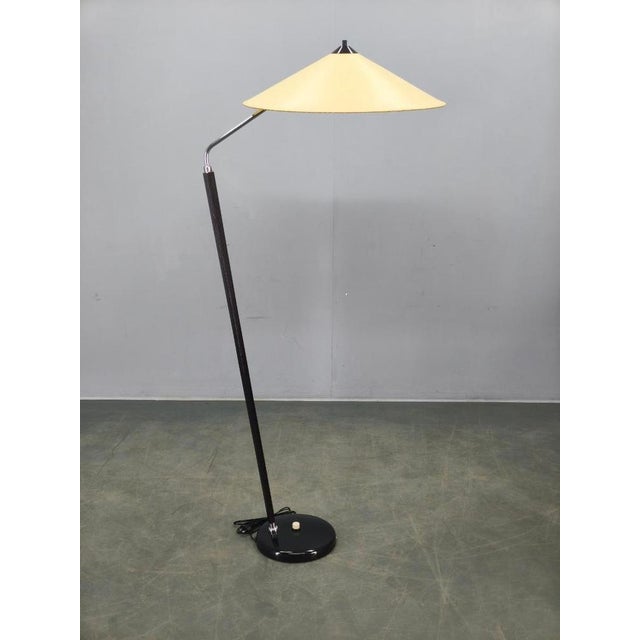 Japanese-inspired mid-century floor lamp produced by zukov in czechoslovakia during the 1970s. This refined lighting...